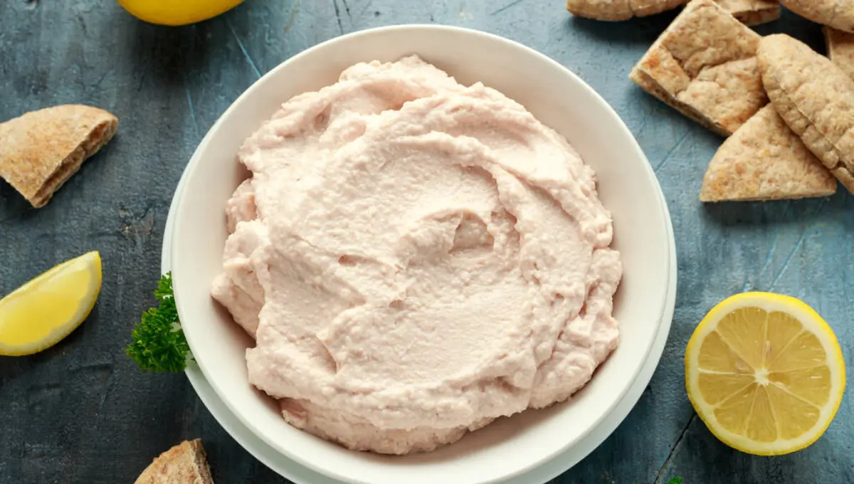 Taramasalata dip made with fish roe in white bowl